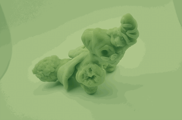 Photo of an abstract figure, its body resembles an insect in varous stages of metamorphosis. The image is dithered in monochrome light green